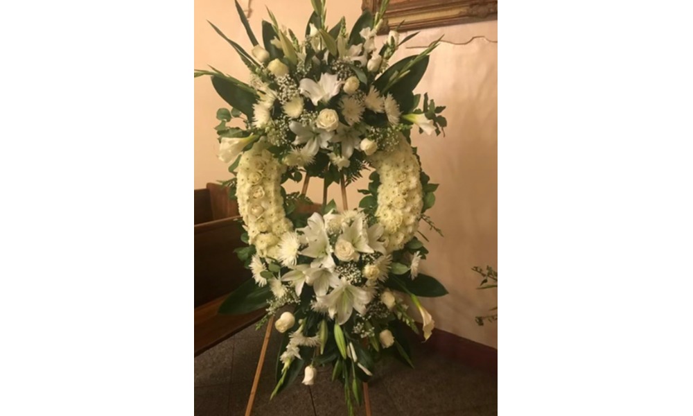 Arreglo de flores para difunto con precio especial en este mes.