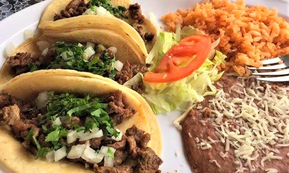 Come and try our special of 3 tacos with rice and beans.